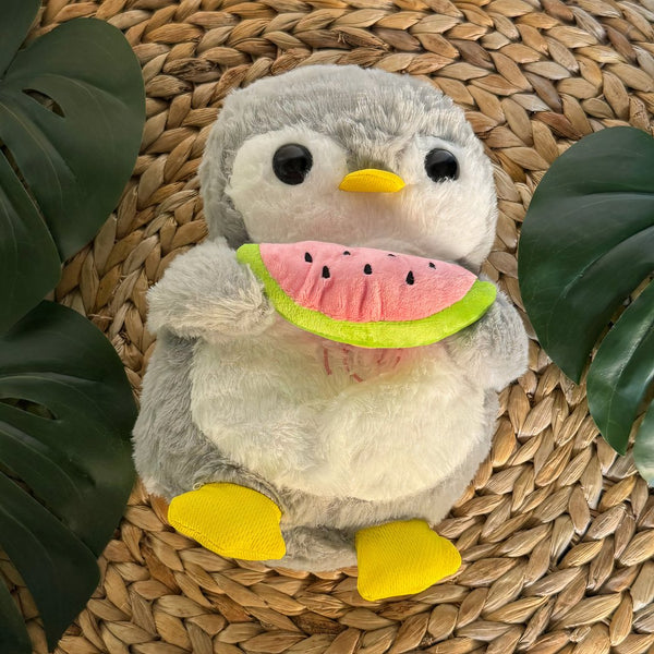 Peluche pingouin qui respire avec berceuses intégrées