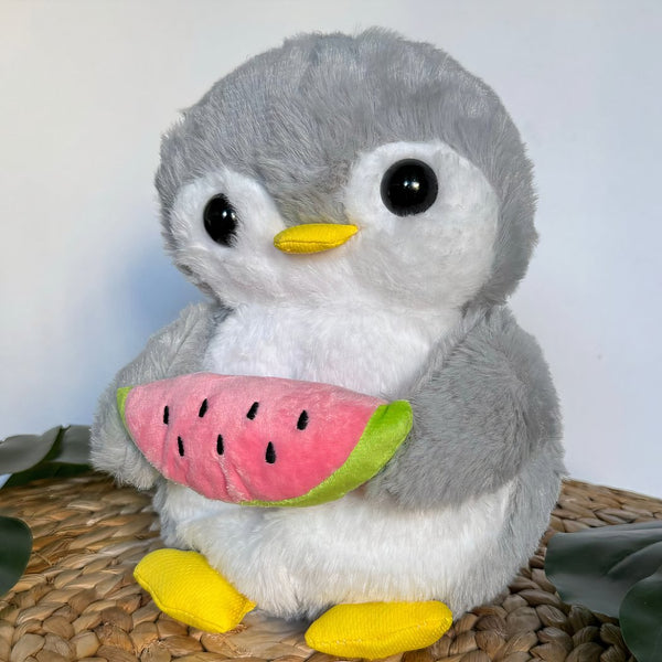 Peluche pingouin qui respire avec berceuses intégrées