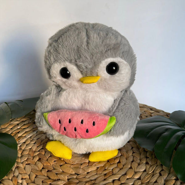 Peluche pingouin qui respire avec berceuses intégrées