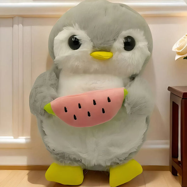Peluche pingouin qui respire avec berceuses intégrées
