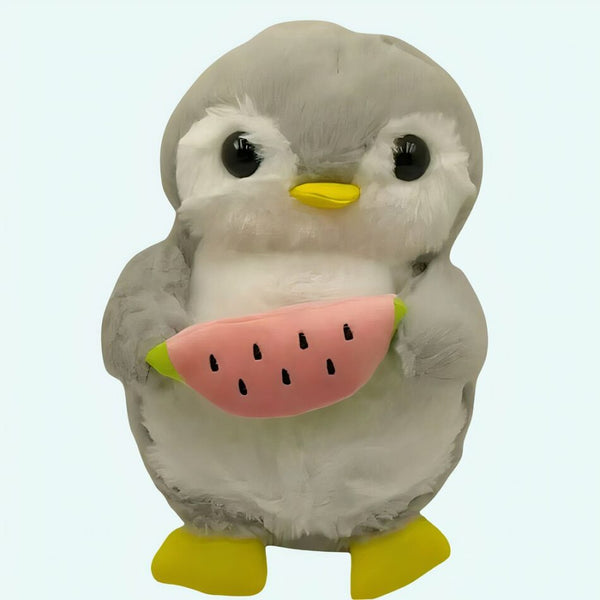 Peluche pingouin qui respire avec berceuses intégrées