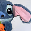 Peluche Stitch avec une citrouille qui respire