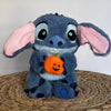 Peluche Stitch avec une citrouille qui respire