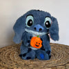 Peluche Stitch avec une citrouille qui respire