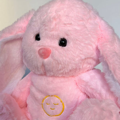 Peluche veilleuse de lapin rose qui respire