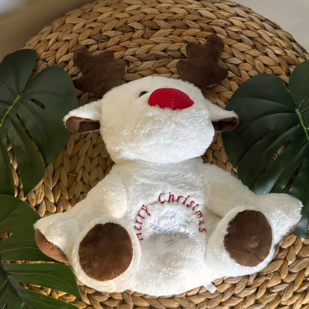 Peluche veilleuse renne de Noël qui respire avec berceuses