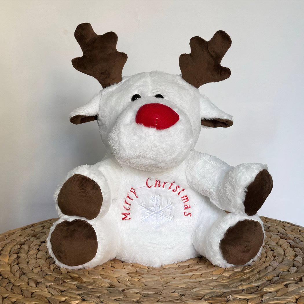 Peluche veilleuse renne de Noël qui respire avec berceuses