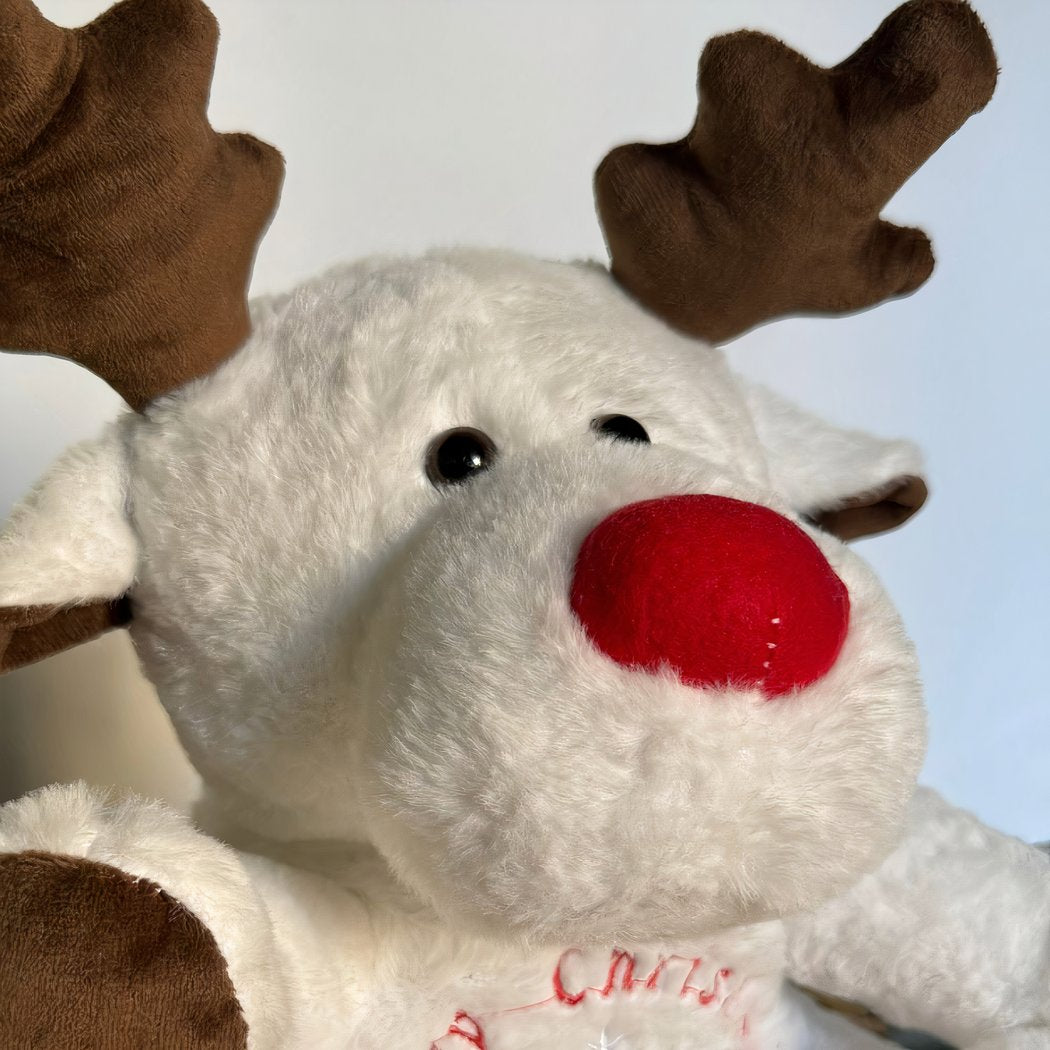 Peluche veilleuse renne de Noël qui respire avec berceuses