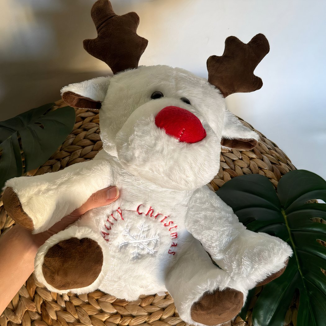 Peluche veilleuse renne de Noël qui respire avec berceuses