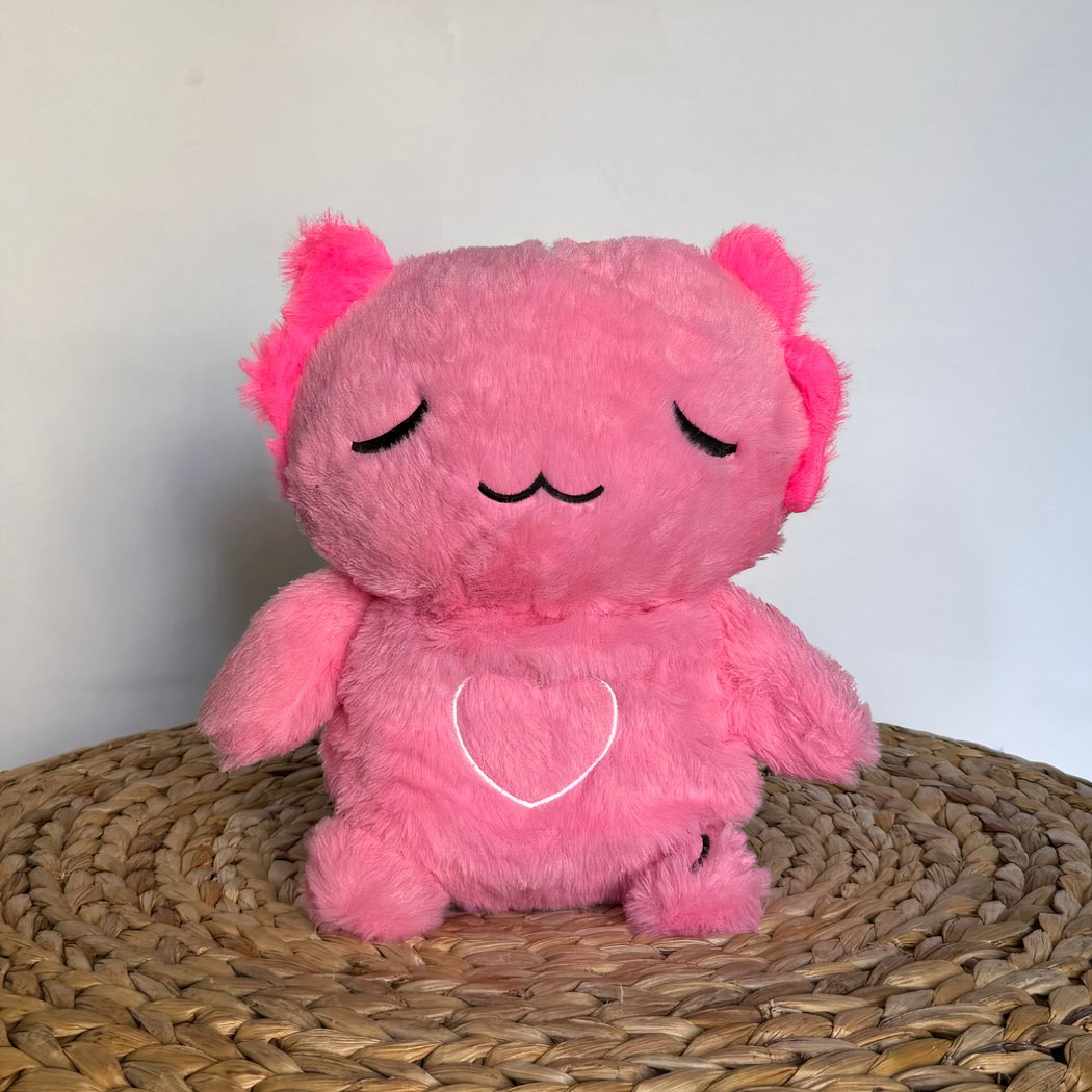 Peluche veilleuse rose d'axolotl qui respire avec berceuses intégrées