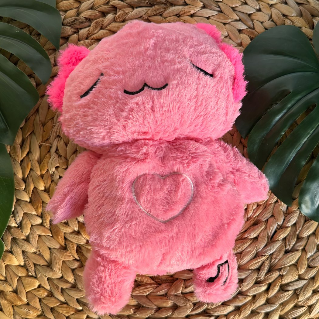 Peluche veilleuse rose d'axolotl qui respire avec berceuses intégrées