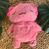Peluche veilleuse rose d'axolotl qui respire avec berceuses intégrées