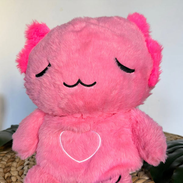 Peluche veilleuse rose d'axolotl qui respire avec berceuses intégrées