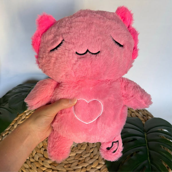 Peluche veilleuse rose d'axolotl qui respire avec berceuses intégrées