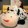 Peluche vache allongée