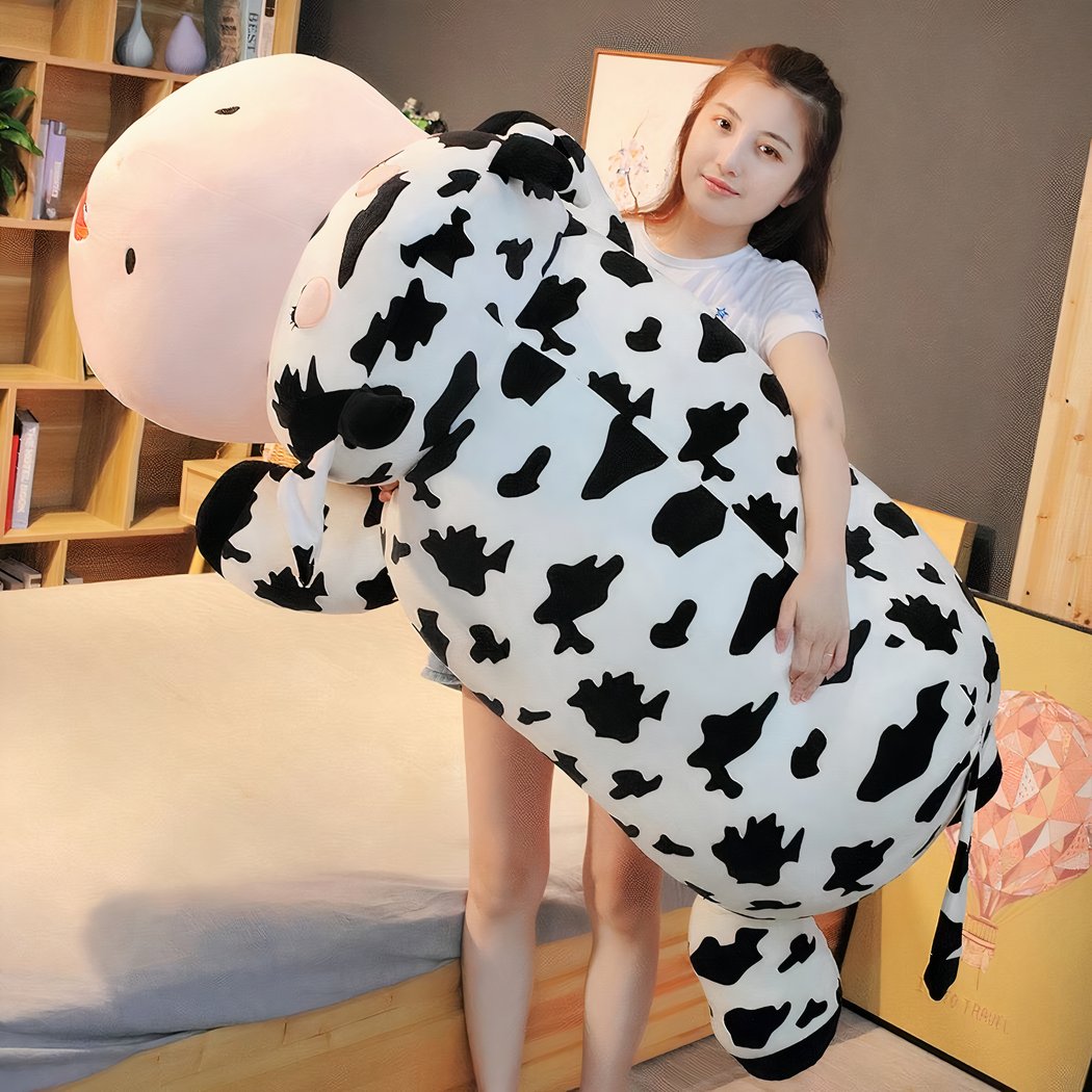 Peluche vache allongée