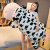 Peluche vache allongée