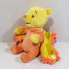 Peluche Winnie l'Ourson dans sa couverture