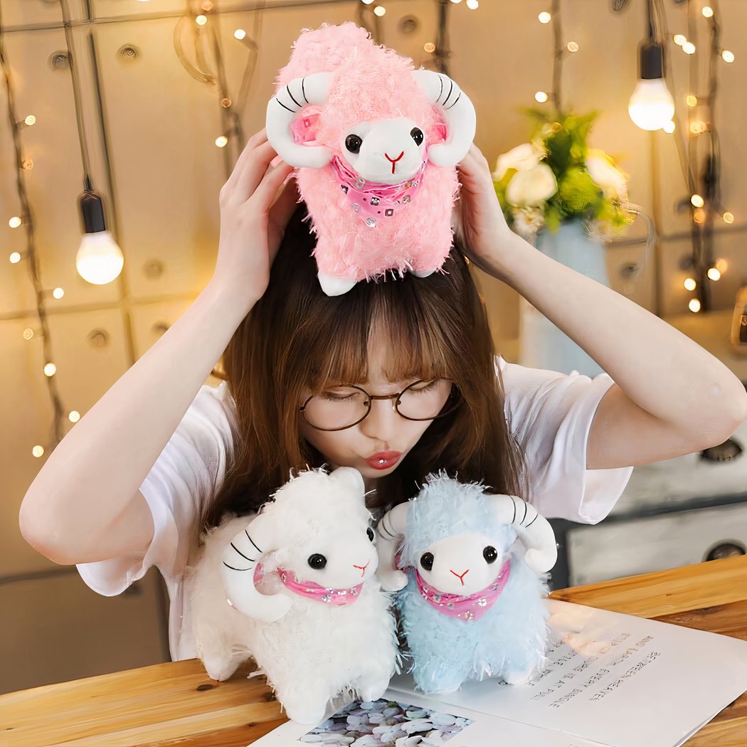 Peluche chèvre pour petite fille