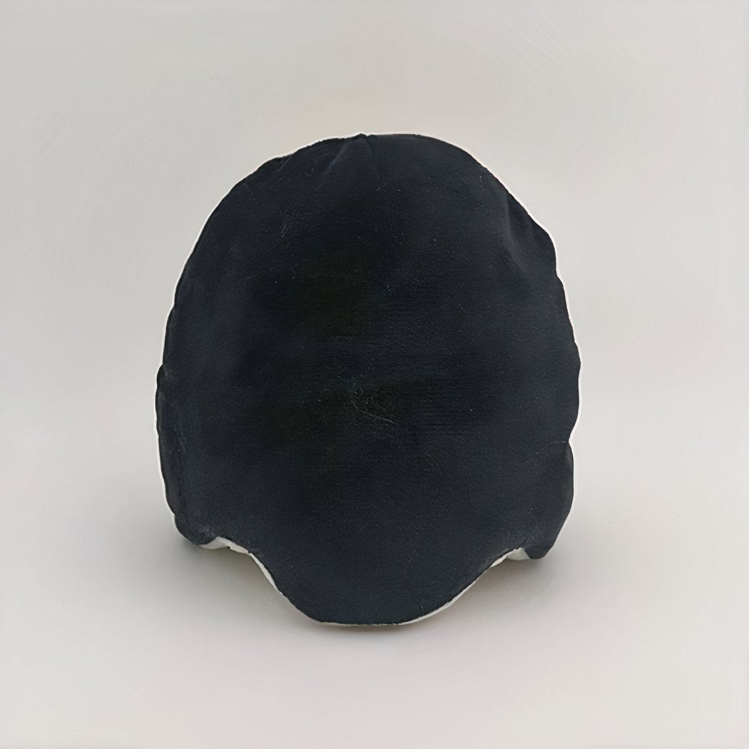 Peluche fantôme noir et blanc réversible, fluorescente