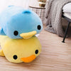 Peluche oreiller canard couché