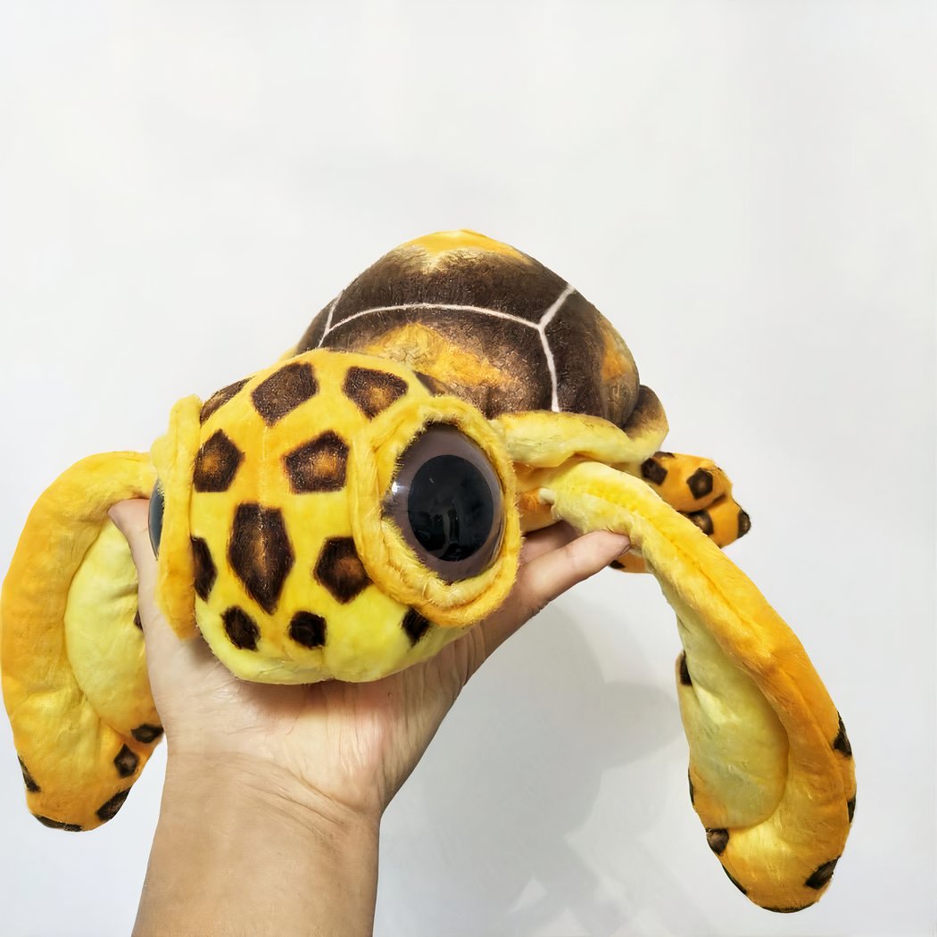 Peluche oreiller tortue à grands yeux