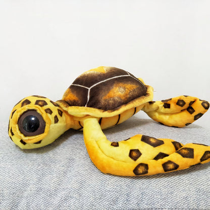 Peluche oreiller tortue à grands yeux