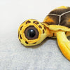 Peluche oreiller tortue à grands yeux