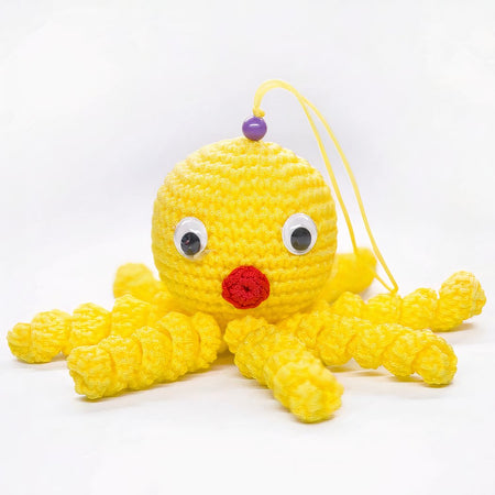 Peluche poulpe jaune douce tressée pour enfant