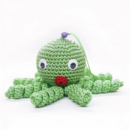 Peluche poulpe verte douce tressée pour enfant