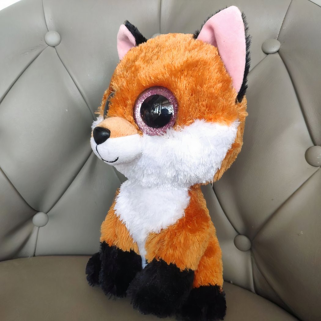 Peluche renard aux grands yeux noirs