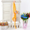 Peluche singe kawaii longue queue jaune