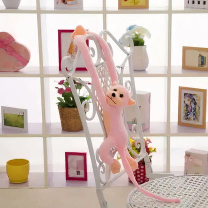 Peluche singe kawaii longue queue rose
