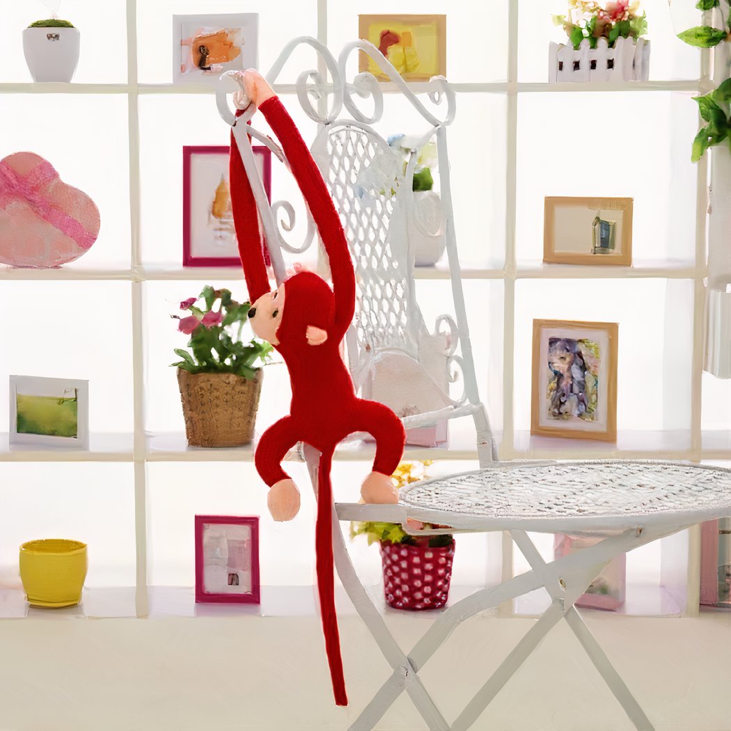 Peluche singe kawaii longue queue rouge