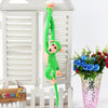 Peluche singe kawaii longue queue verte