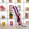 Peluche singe kawaii longue queue violette