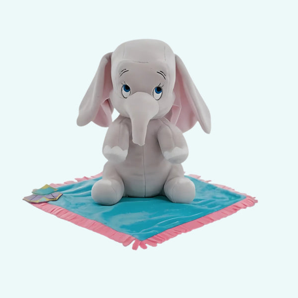 Peluche Dumbo dans sa couverture