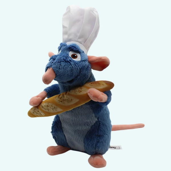 Peluche Ratatouille avec une baguette de pain