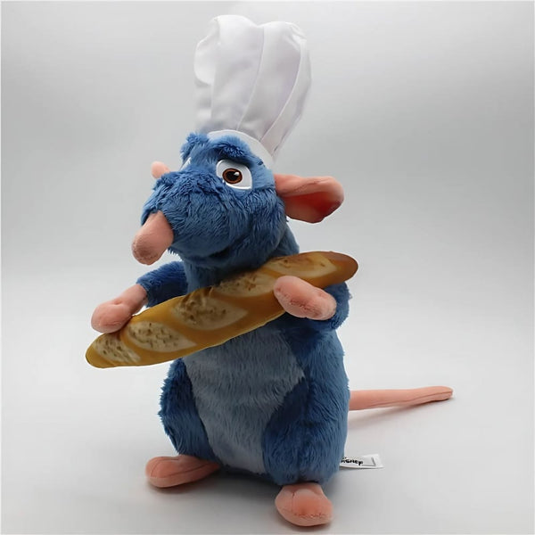 Peluche Ratatouille avec une baguette de pain