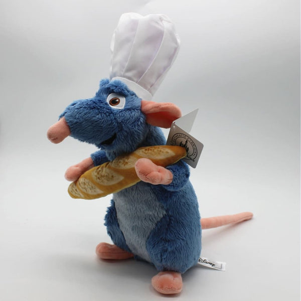 Peluche Ratatouille avec une baguette de pain