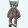 Peluche chat beige mécontent assis