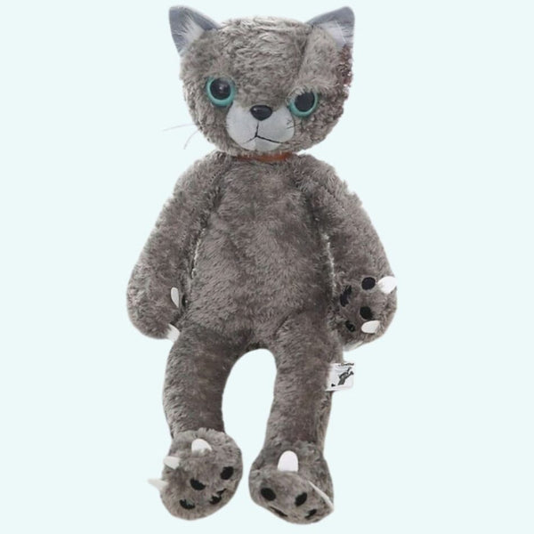 Peluche chat beige mécontent assis